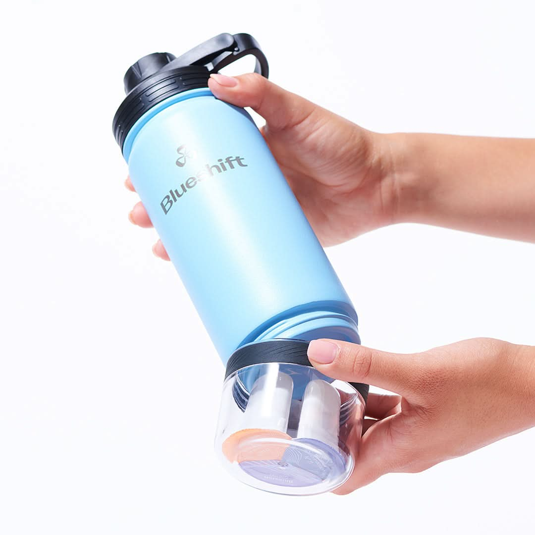 https://www.blueshiftnutrition.com/cdn/shop/products/blueshift-sidekick-bottle-pod-storage-attaching_a31acd0e-31e6-42b8-93e5-38f6c1ecec63.jpg?v=1672416976